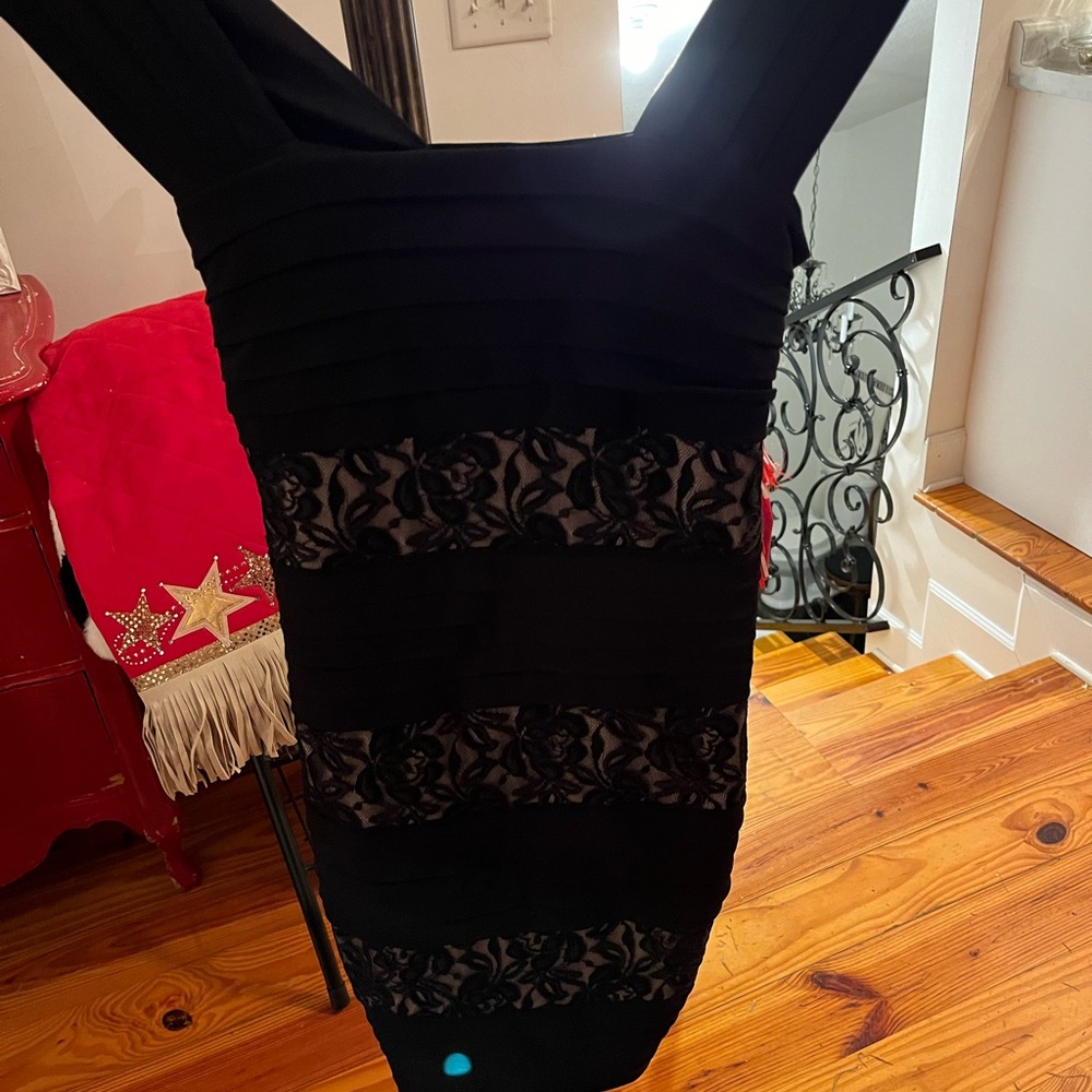NWT LBD BEAUTIFUL.    Back is solid black.  Front has lace insets